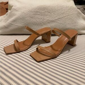 BY FAR Tanya patent-leather mules in “Nude”